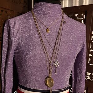 Purple sparkly stretchy body suite size small